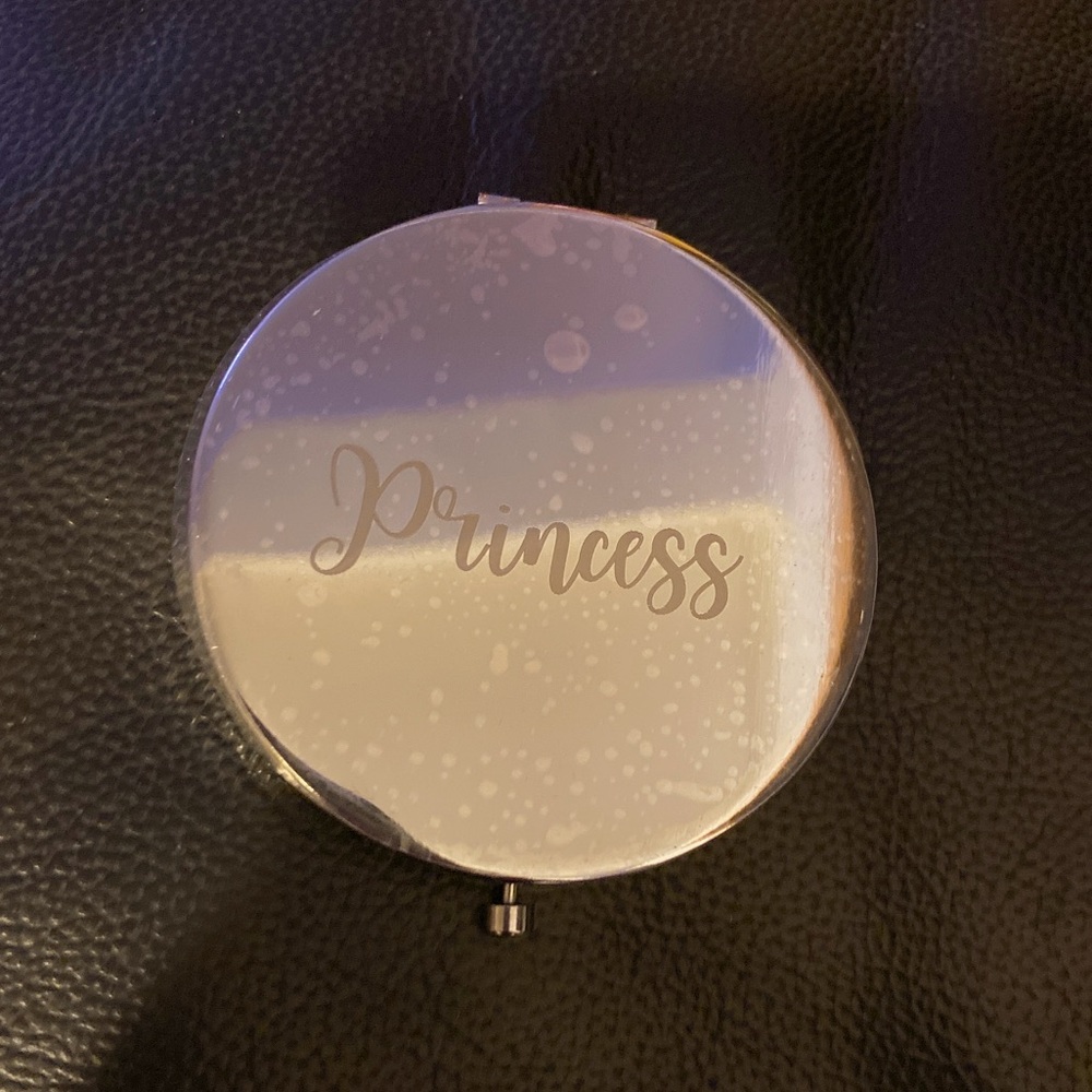 Double sided compact makeup mirror